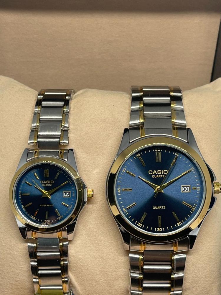 طقم كاسيو ميناء كحلي و اطار رمادي و ذهبي