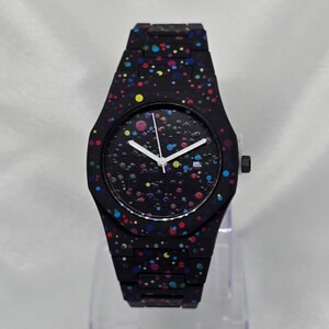 ساعة كاجوال رجالي كاربون اللون أسود تيتانيوم منقط بعدة ألوان مختلفة عقارب لون أبيض