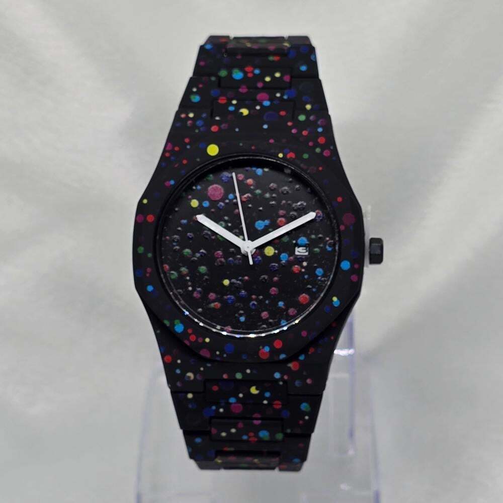 ساعة كاجوال رجالي كاربون اللون أسود تيتانيوم منقط بعدة ألوان مختلفة عقارب لون أبيض