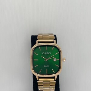 ساعة كاسيو اطار نحاسي و اطار أخضر