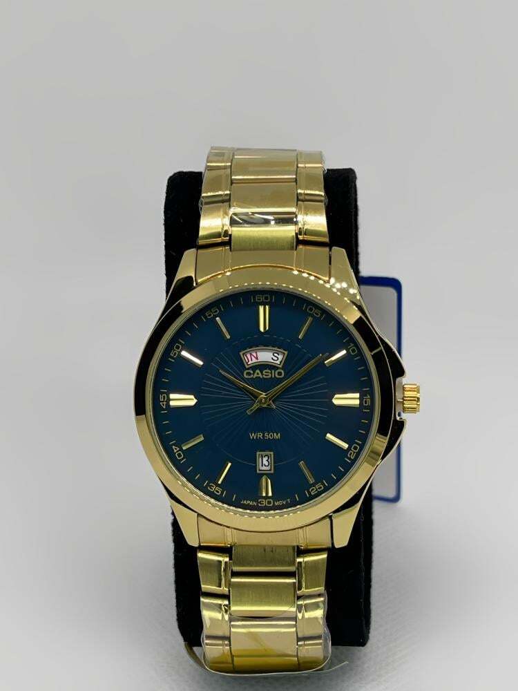 ساعة كاسيو رجالي اطار ذهبي ميناء كحلي